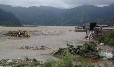 Amochhu flooding damages properties--