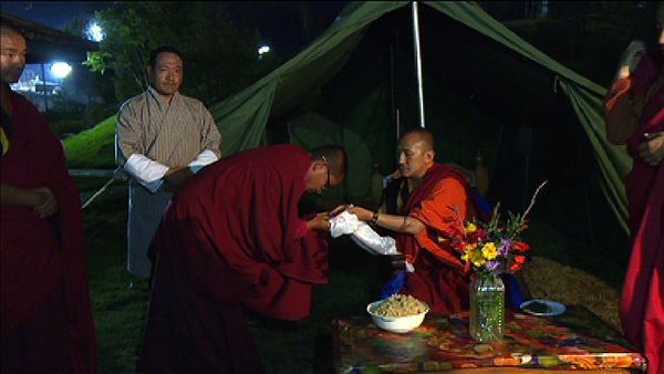 Organisers of a religious ceremony donate