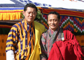 His Majesty confers Red Scarf to Dasho Karma Tshiteem