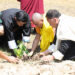 His Majesty plants trees in Punakha