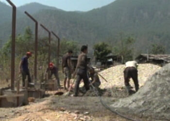 Villagers in Monggar pick up odd jobs to make ends meet