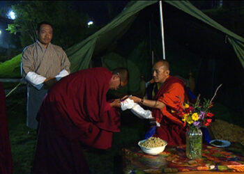 Organisers of a religious ceremony donate