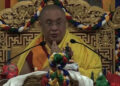 Je Khenpo administers oral transmission in Monggar