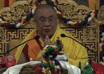 Je Khenpo administers oral transmission in Monggar