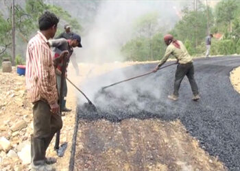 Blacktopping of Drepoong road almost halfway through