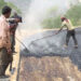 Blacktopping of Drepoong road almost halfway through