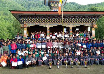 Nganglam Central School lifts the winners trophy