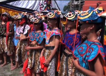Students perform mask dances in Phuentshogling tshechu