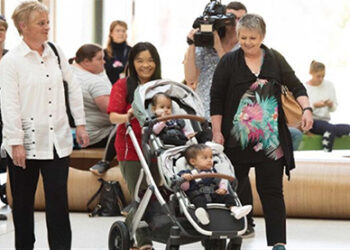 Separated twins leave hospital