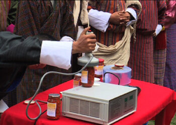 Polakha farmers’ group receives machine to package cherry pepper pickles