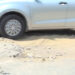 Bad road between Trailing and automobile workshop in Monggar irks commuters