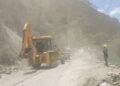 Clearing loose boulders at Gewathang, to prevent further disaster