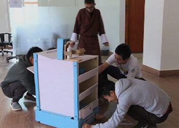 High school students build a robot to help maintain physical distancing