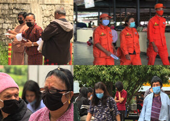 Volunteers making sure people use face masks properly in selected public places