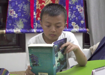 A young vlogger winning hearts