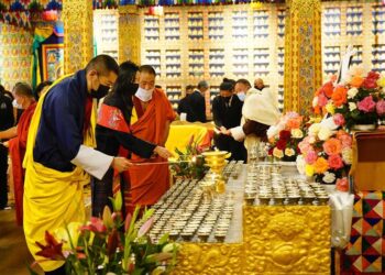 Their Majesties offer prayers and butter lamps for the late former Japanese PM