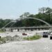 Four-lane arch bridge over Aipoli stream along Gelephu-Sarpang highway