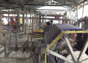 Assamese women make a living from weaving gho and kira