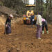 Volunteers help maintain the road to Jela Dzong, Paro