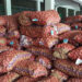 Potato growers and traders struggling as price plummets in auction yard