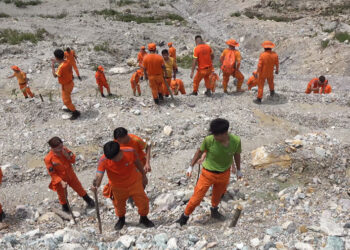 Planting trees to mitigate landslide risks in Pachugang, Phuentshogling