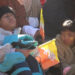 Two girls defy disabilities to attend National Day celebration