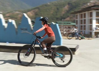 Four Bhutanese women undergoing training to become professional mountain bike guides