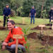 Tourists plant trees in Bhutan to offset carbon footprints