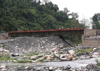 Permanent bridge nearing completion over Panchfaly stream, Sarpang
