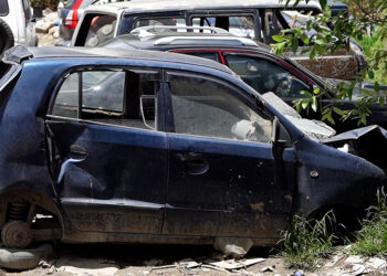 Unclaimed vehicles crowd Olakha workshop area, disrupting business