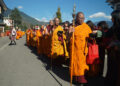 Nuns from Bhutan and abroad walk Thimphu streets for alms