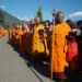 Nuns from Bhutan and abroad walk Thimphu streets for alms