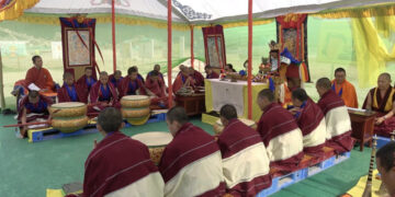 Over a hundred gather to pray for smooth progress of GMC and airport construction