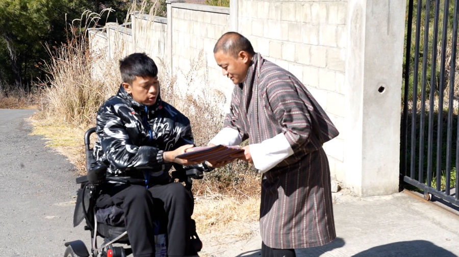 Selling hope from a wheelchair